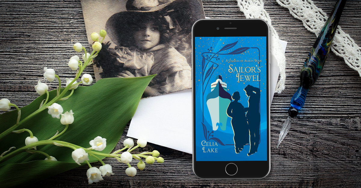 Cover of Sailor's Jewel displayed on a phone, resting on a desk with a vintage photograph, a blue glas dip pen, and several sprigs of lily-of-the-valley.