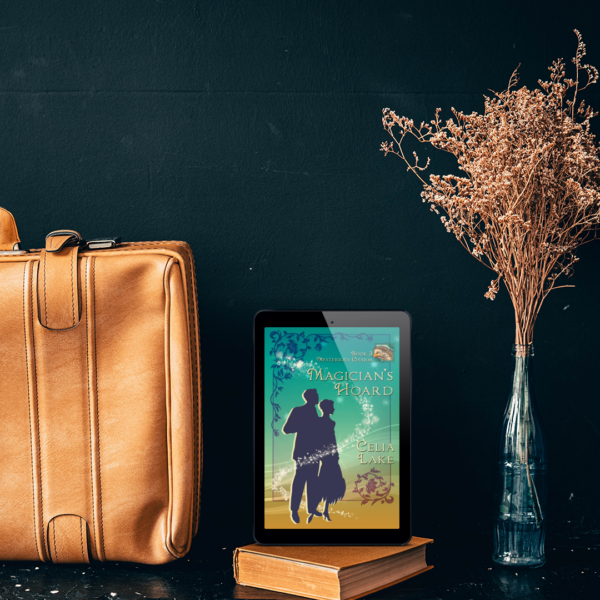 Cover of Magician's Hoard displayed on a tablet between a pale leather satchel and some decorative golden grass in a vase.