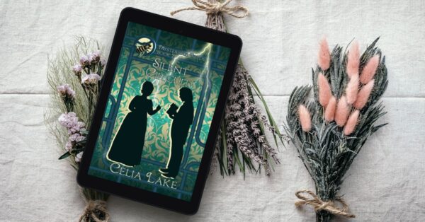 Silent Circuit displayed on a tablet on a table with dried lavender and other flowers. The cover has a silhouetted man and woman in Victorian dress face each other. He is holding a book open for her, as her hand moves to turn a page. They’re on a background of green damask with green pipes, a streak of lightning behind them. A bee is inset on top of a gear in the top left.
