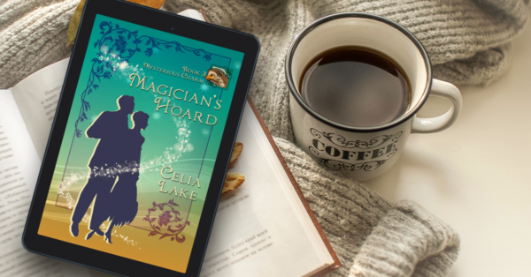 Cover of Magician's Hoard displayed on a tablet with a cup of tea.